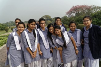 Agra, Jodhpur, Rajasthan, North India, Asia, A group of cheerful girls in uniforms poses smiling in