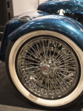 Rear tyre of a motorbike with chrome rim and retro-style wire spokes, dortmund, deutchland