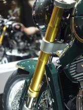 Detail of the front suspension of a modern motorbike with golden fork, dortmund, deutchland