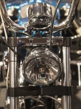 Front view of a motorbike with dominant chrome headlights, dortmund, deutchland