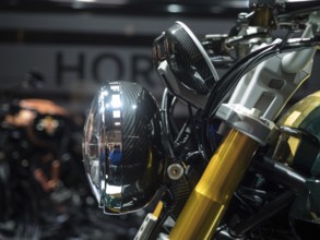 Modern headlights on a motorbike with gold accents and carbon elements, dortmund, deutchland