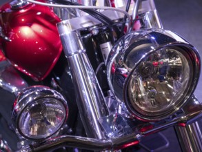 Double headlights with chrome details on a retro-style motorbike, dortmund, deutchland
