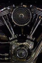 Detailed motorbike engine with accentuated shiny chrome fans and valves, dortmund, germany
