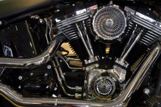 Detailed view of a shiny Harley-Davidson motorbike engine, impressive mechanical workmanship,
