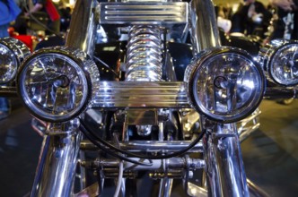 Close-up of a shiny motorbike headlight at an exhibition, dortmund, germany