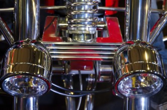 Close-up of chrome parts and headlights of a motorbike with mechanical precision, dortmund, germany