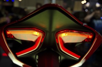 Futuristic designed red tail lights of a motorbike in detail, dortmund, germany