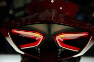 Close-up of striking red motorbike tail lights, dortmund, germany