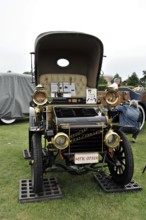 Petigars Prat Carrabi Voiturette, built in 1898, classic car, black and gold vintage car in an