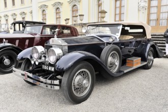 Elegant black convertible classic car in front of a historic building, Retro Classics meets