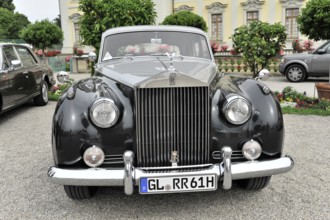 Rolls-Royce Silver Cloud, Classic car, Elegant black Rolls-Royce classic car in front of a historic