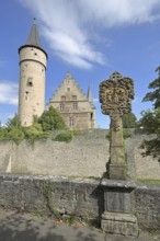 Cathedral chapter palatium, St Nicholas' Tower, historic wayside shrine from 1697 with crowning of
