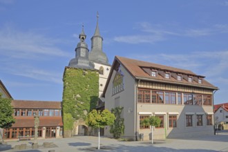 Late Gothic gate tower and church tower, modern building, market square, Saal an der Saale, Lower