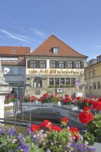 Historic Hotel and Restaurant Schlundhaus, obelisk fountain, market fountain, flower decoration,