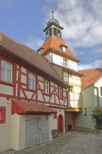 Fortified church, town hall from behind and town musicians' tower, gate tower, half-timbered house,