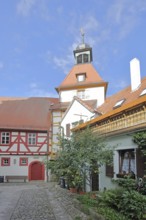 Fortified church with town musician tower and town hall from behind, gate tower, half-timbered