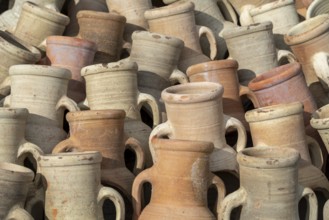 Full frame shot showing lots of sunny illuminated amphoras