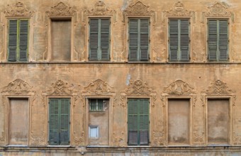 Historic house facade seen in Porto Maurizio in Oneglia, a former town in northern Italy on the