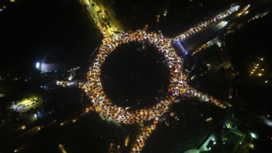 Aerial view shows crowds of Syrians celebrating in Umayyad Square in central Damascus after the