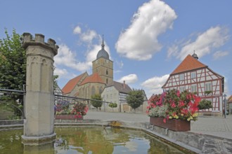 Market fountain, town hall and town church of Our Lady built 16th century, half-timbered house,