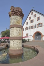 Fairytale fountain with reliefs of fairytale figures and town hall, market square, Steinau an der