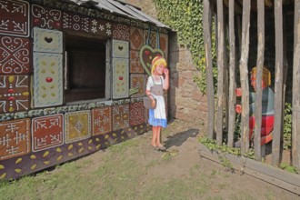 Gingerbread house for the fairy tale Hansel and Gretel, fairy tale figures, hut, wooden posts,