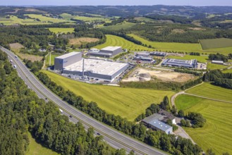 Aerial view, industrial area, industrial park Grünewald with construction site, motorway A45, hilly