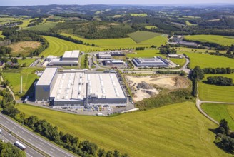 Aerial view, industrial area, industrial park Grünewald with construction site, motorway A45, hilly