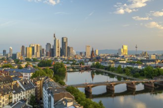 Frankfurt City Skyline, Residential Buildings, Bridges and Main River on Sunny Morning. Wide Shot.