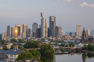 Frankfurt City Skyline, Residential Buildings, Bridges and Main River at Sunrise. Aerial View.