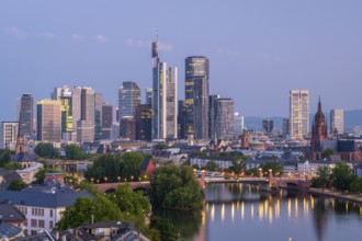Illuminated Frankfurt City Skyline, Residential Buildings, Bridges and Main River at Morning