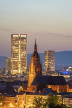 Illuminated Frankfurt Cathedral, Residential Buildings and City at Night. Aerial View. Blue Hour.