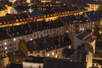 Old Residential Buildings in Frankfurt City at Night with Lights in Windows. Aerial View. Hesse,
