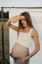 Pregnant, attractive woman, 25+