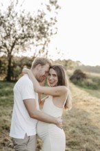 Pregnant, young woman with partner