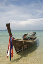 Longtail boats on the beach of Koh Muk, Koh Muk, Koh Muk, Koh Muk, Thailand