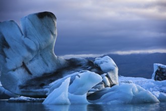 Calved icebergs, glacial lake, Jökularson, Iceland