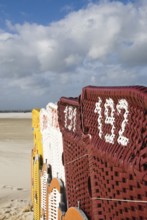 The beach chairs in the village of Norddorf on the North Frisian island of Amrum go into