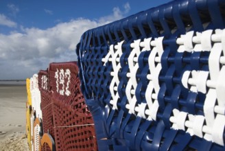 The beach chairs in the village of Norddorf on the North Frisian island of Amrum go into
