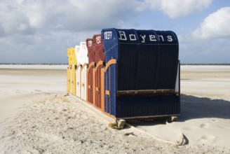 The beach chairs in the village of Norddorf on the North Frisian island of Amrum go into