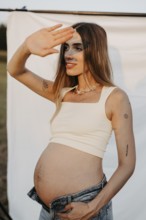 Pregnant, attractive woman, 25+