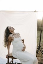 Pregnant, attractive woman, 25+