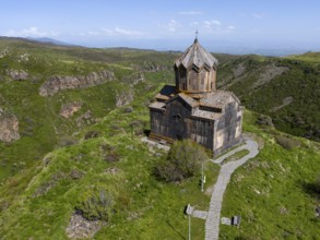 Church on a green hill with a view of a mountain landscape, aerial view, Church of the Mother of