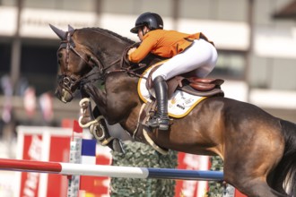 Sanne Thijssen of the Netherlands, riding Cupcake Z, competes in the first round of the 2025 BMO