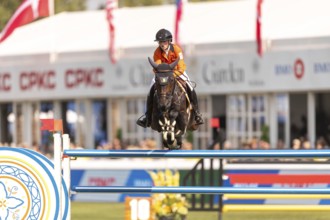 Sanne Thijssen of the Netherlands, riding Cupcake Z, competes in the first round of the 2025 BMO