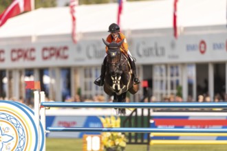 Sanne Thijssen of the Netherlands, riding Cupcake Z, competes in the first round of the 2025 BMO