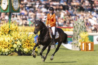 Sanne Thijssen of the Netherlands, riding Cupcake Z, competes in the first round of the 2025 BMO