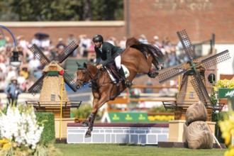 Yuri Mansur of Brazil, riding Cupfer, competes in the first round of the 2025 BMO Nations Cup