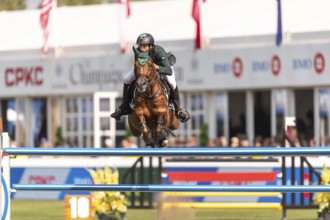 Yuri Mansur of Brazil, riding Cupfer, competes in the first round of the 2025 BMO Nations Cup