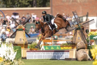 Yuri Mansur of Brazil, riding Cupfer, competes in the first round of the 2025 BMO Nations Cup